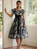 Elegant Black and White Floral Fit-and-Flare Dress