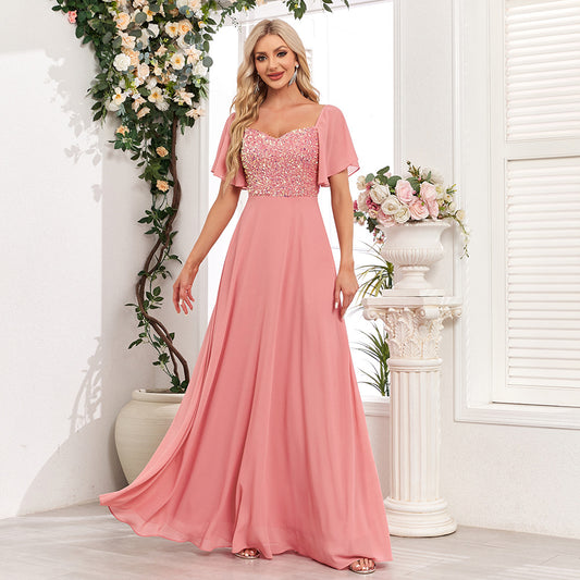 Elegant Pink Maxi Dress with Pleated Skirt