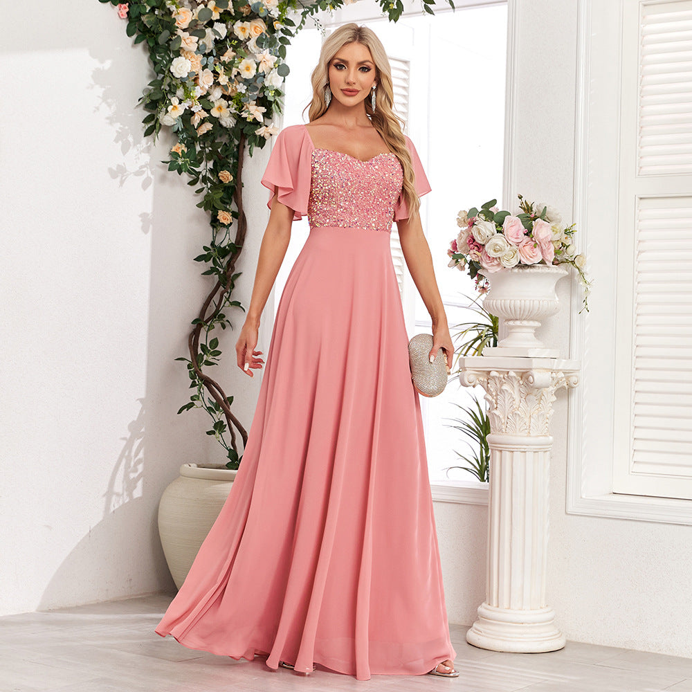 Elegant Pink Maxi Dress with Pleated Skirt