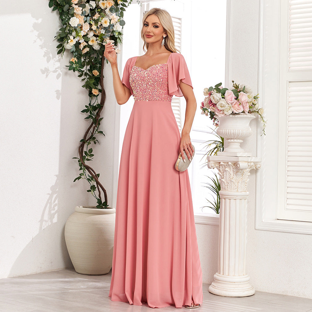Elegant Pink Maxi Dress with Pleated Skirt