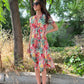 Vestido Midi escote pico estampado hojas palmera multicolor